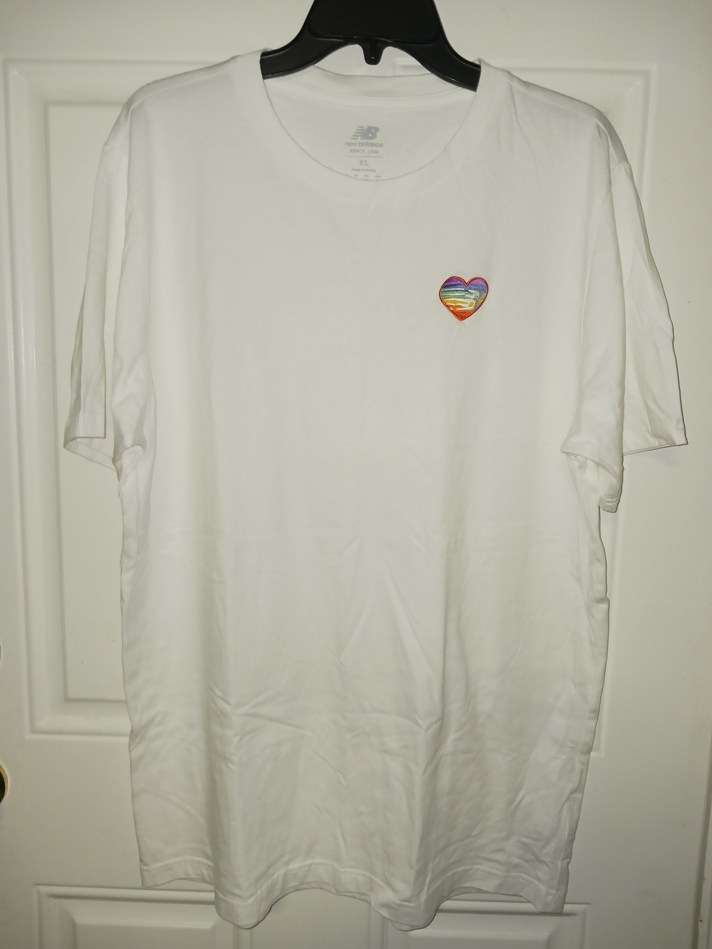 New Balance White Short Sleeve Tee with Rainbow Heart Patch
